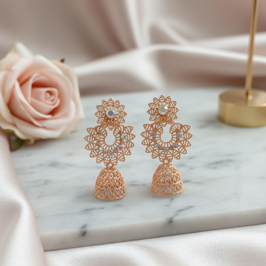 Ornate Rose Gold Floral Jhumkas at Rs 1